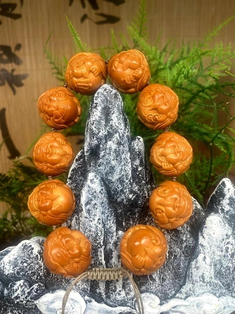 锦和，荷叶横财橄榄核雕手串