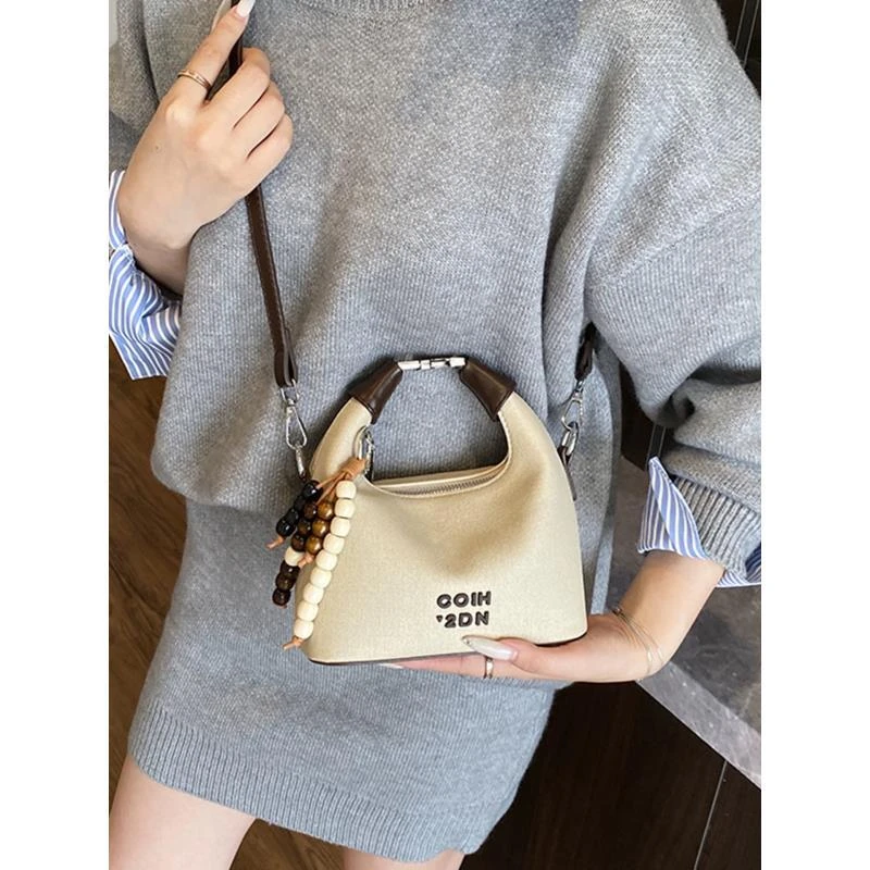 00Purse轻奢女包高级感小众包包帆布单肩斜挎包韩版饺子包6174