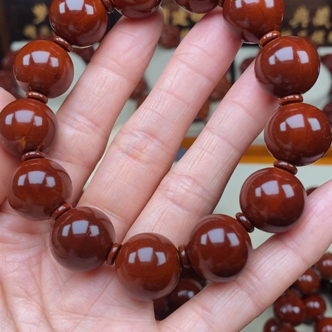 橄榄核吊坠杰*张光珠，