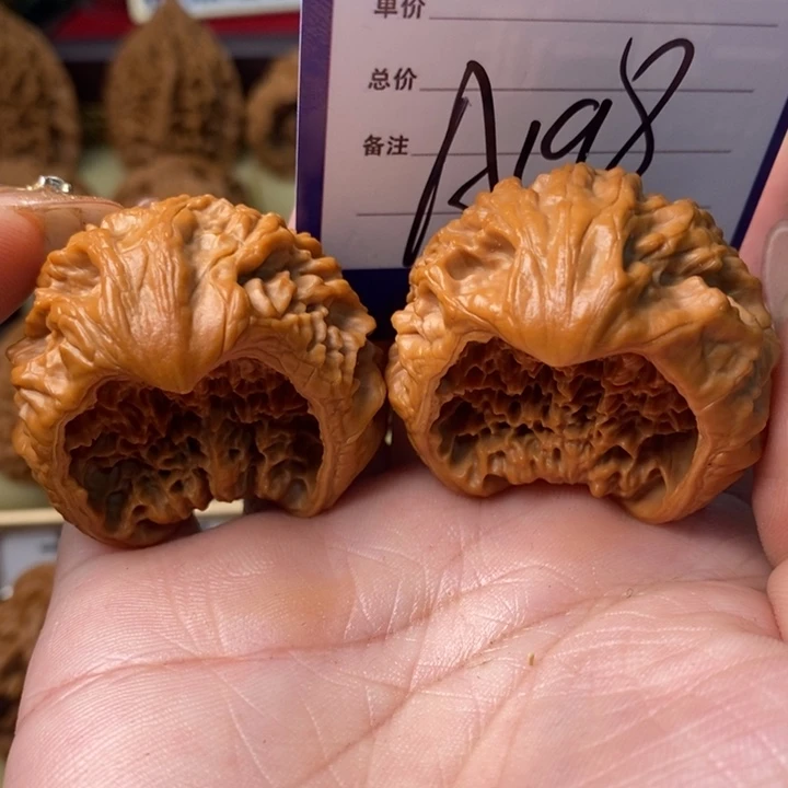 天***磊桃核把件全品极品聚宝盆