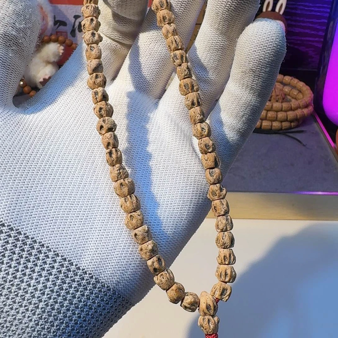 吊坠柏香籽/百香籽对眼尸陀林手持