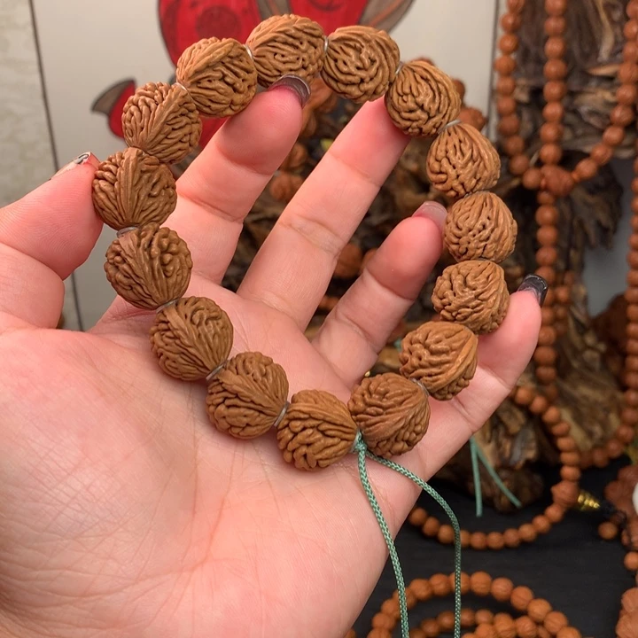 O***G吊坠桃核17刺龙编织