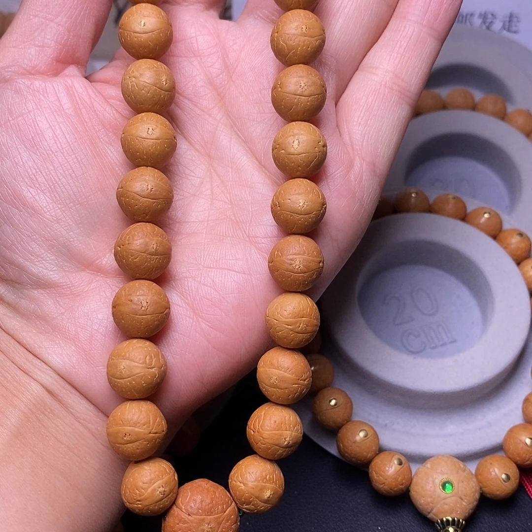 凤眼菩提吊坠12.5手持