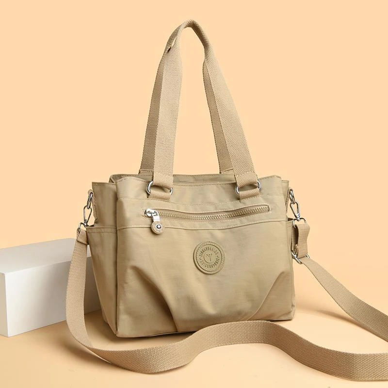 米琦袋鼠手提包女士帆布斜挎包时尚简约轻便百搭大容量旅行单肩包