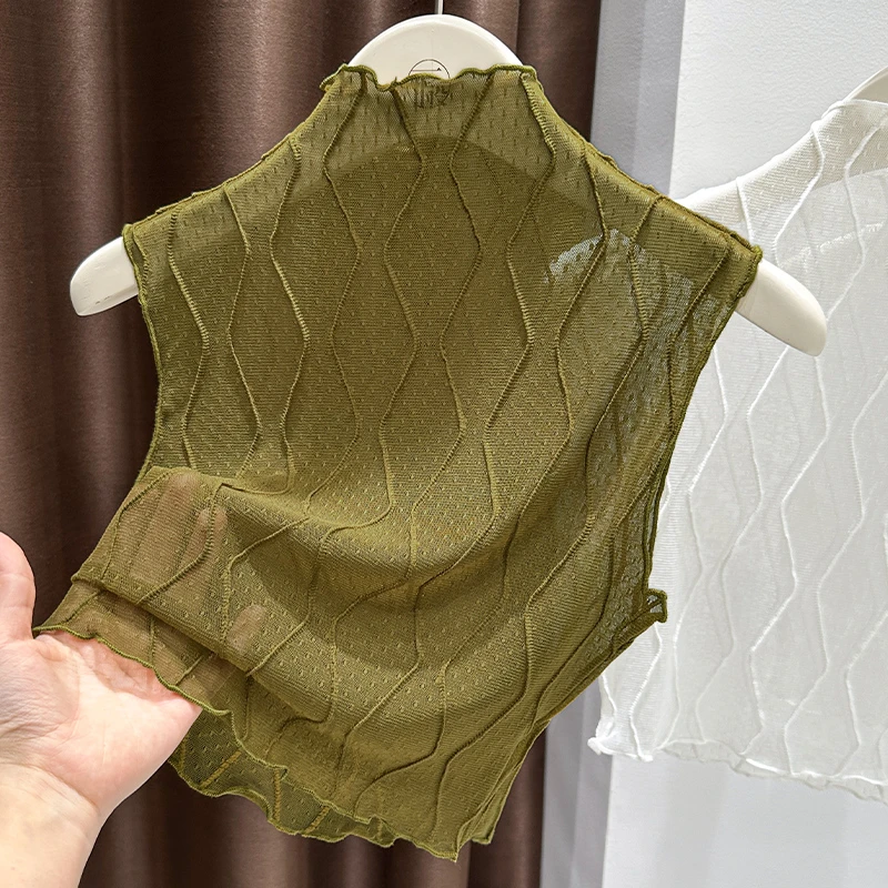 绿色时髦感镂空蕾丝衫女秋季新款洋气透视上衣叠穿半高领无袖小衫