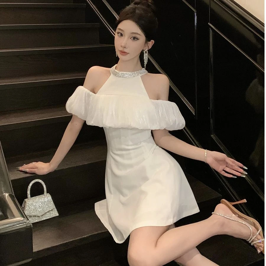 高级感精致女孩连衣裙2025夏季新款挂脖镶钻设计感重工礼服裙短裙