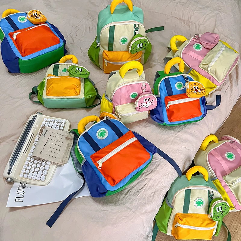 韩版新款儿童书包轻便幼儿园小学生出游研学双肩包可爱卡通亲子包