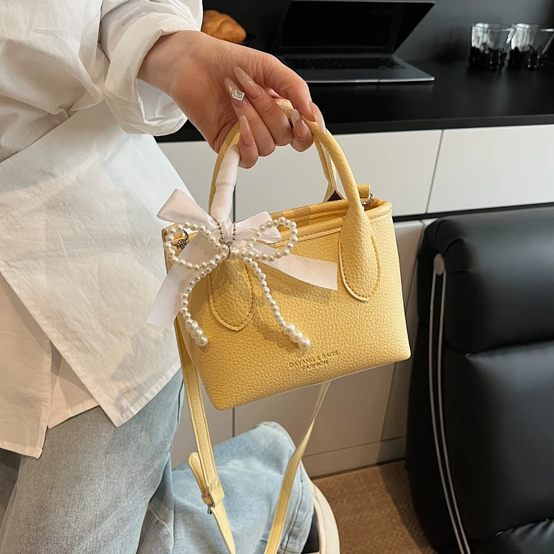 夏季小包包女2025新款百搭单肩斜挎包简约爆款今年流行手提水桶包