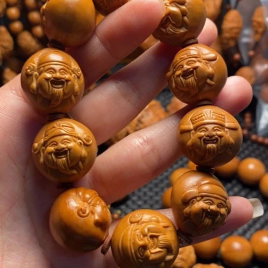 橄榄核吊坠淡****烟光背财神头