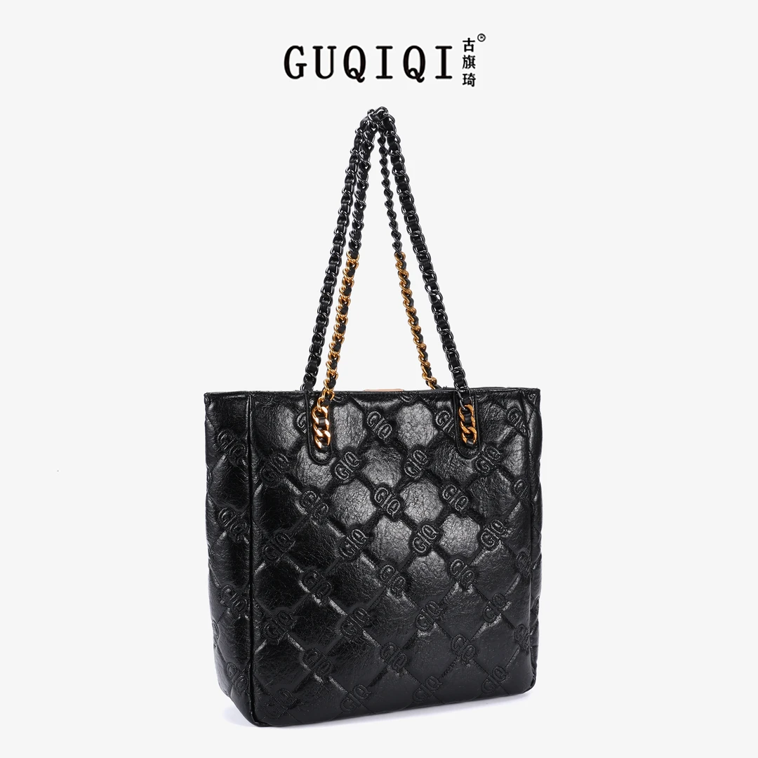 GUQIQI/古旗琦精美刺绣洋气托包GQ1011