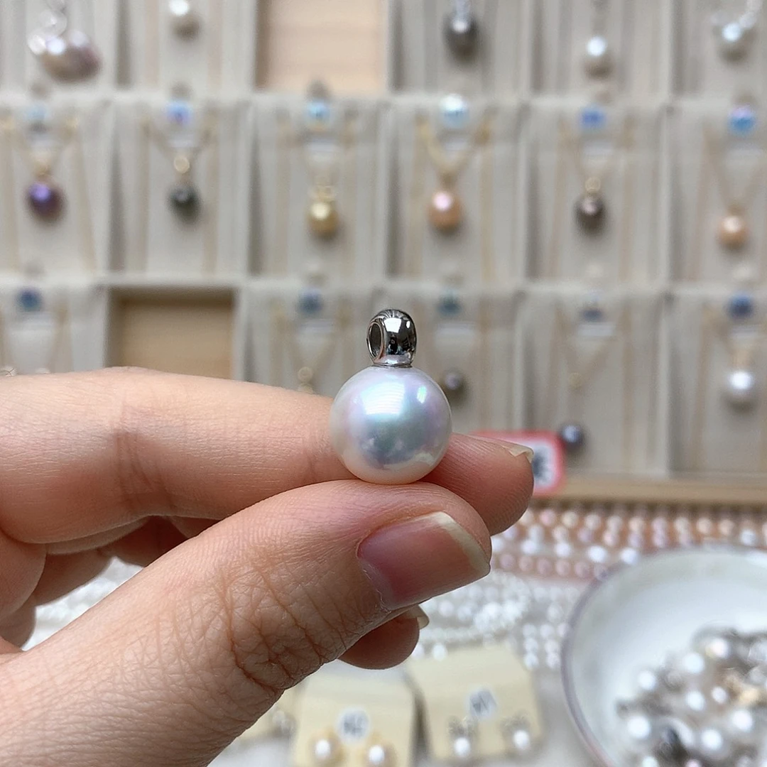 淡水珍珠吊坠(不含链)银S925镶嵌珍****?