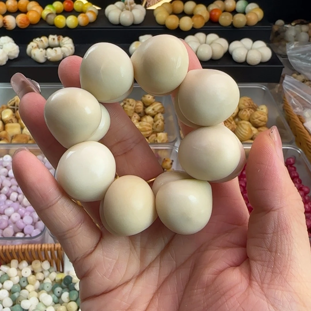 菩提根/象牙果手串微瑕牙果卡25光面屁桃手捻1个