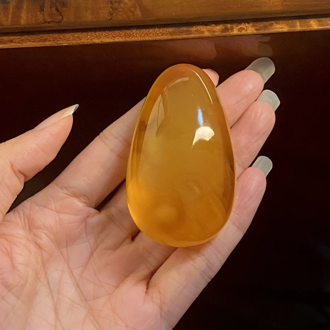 琥珀蜜蜡荧光拉丝俄料蜜糖红水滴32.9g