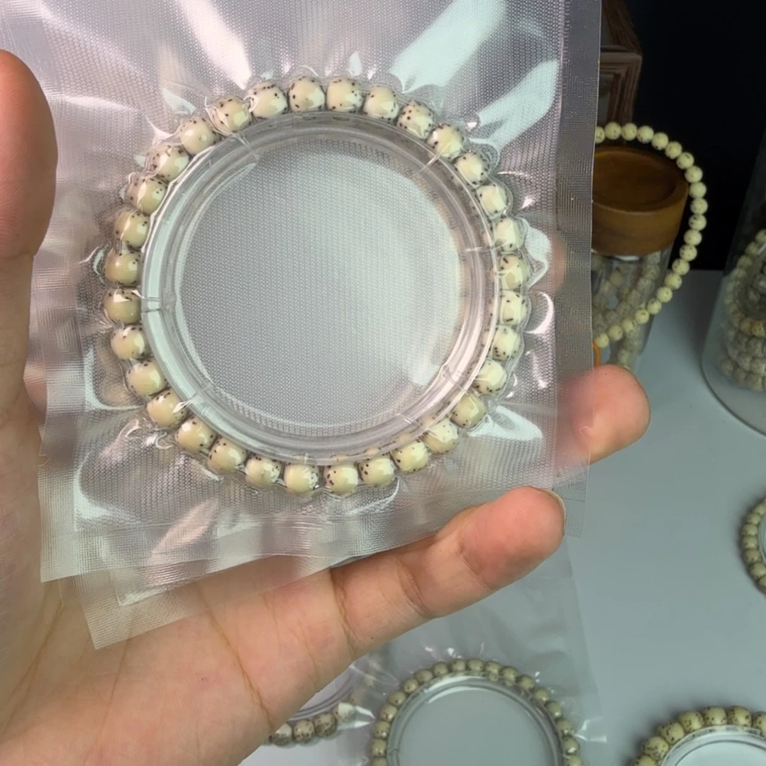 伤***.星月菩提手串星月菩提河豚