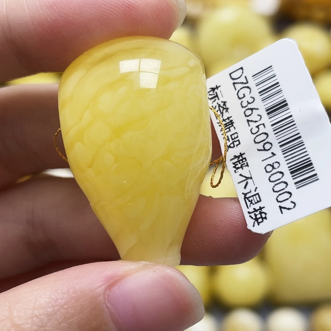 琥珀未镶嵌裸石20*31.7mm金妖虎皮三通微瑕