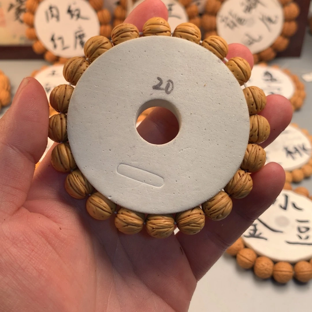 桃核手串哦*哟东北奶豆