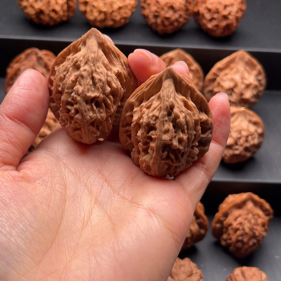 抓***崽把件文玩核桃鸡心