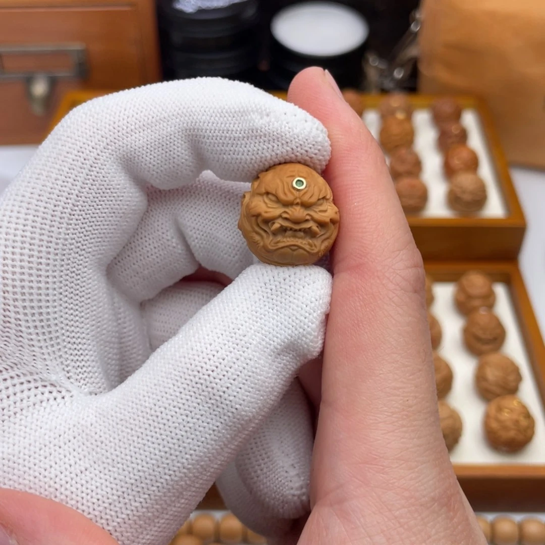 文玩核桃吊坠<****嗯猴头核桃雕刻