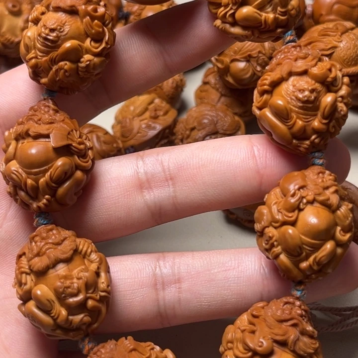 用***情橄榄核手串整身骑兽钟馗