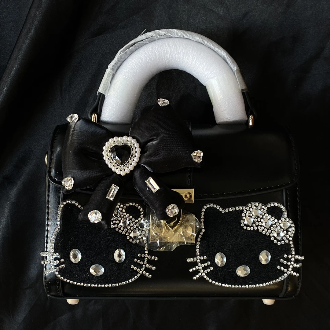 黑色手作创意零钱包手机包斜挎