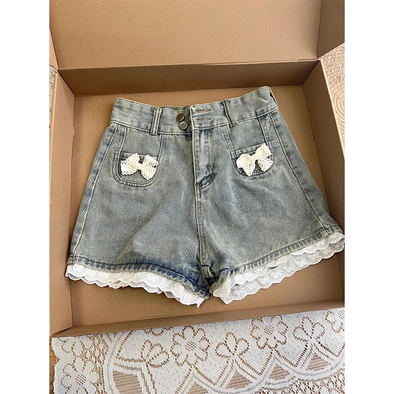 韩系设计感拼接蕾丝花边牛仔裤女夏季新款少女蝴蝶结百搭高腰短裤
