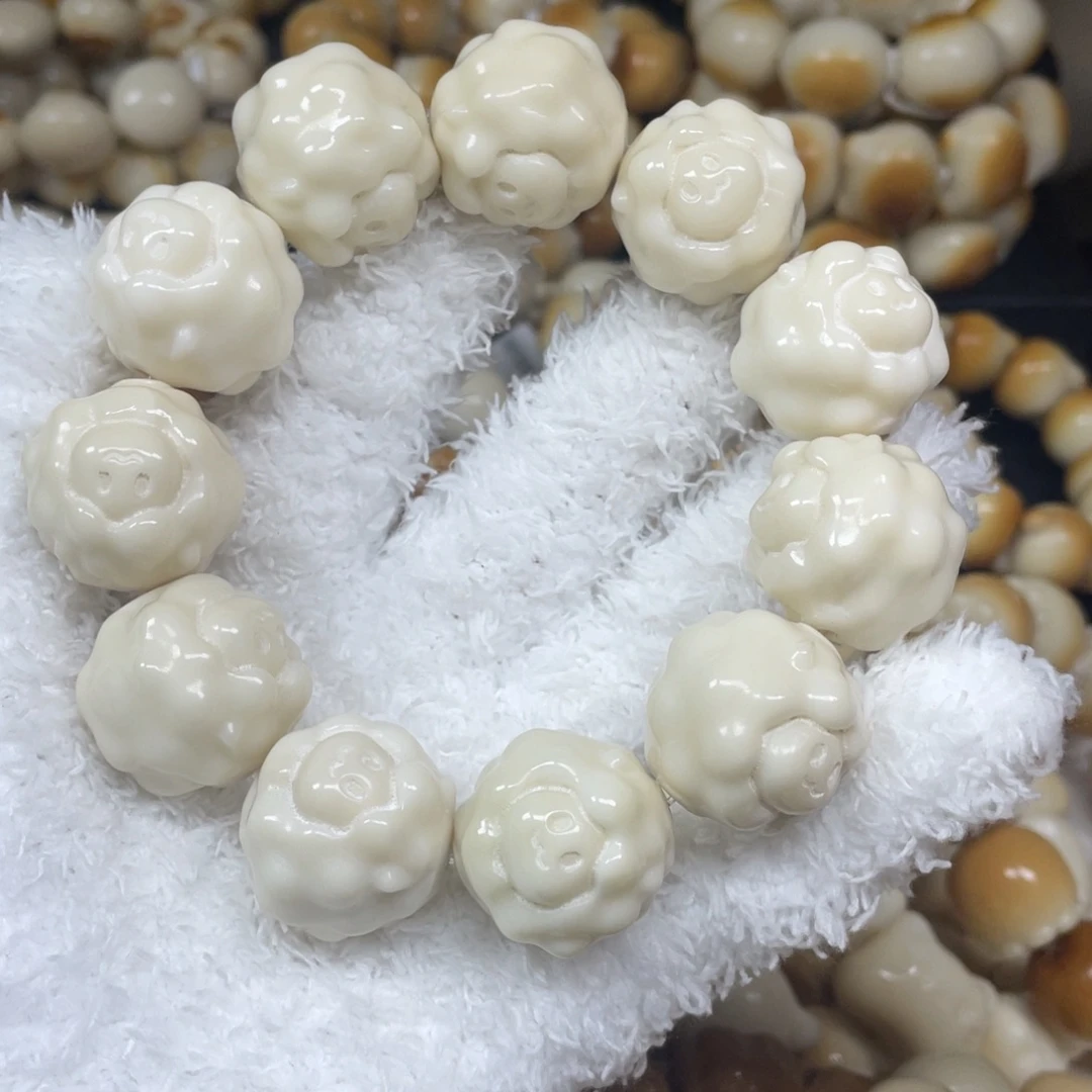 菩提根/象牙果手串12.4,1微瑕白羊啦24