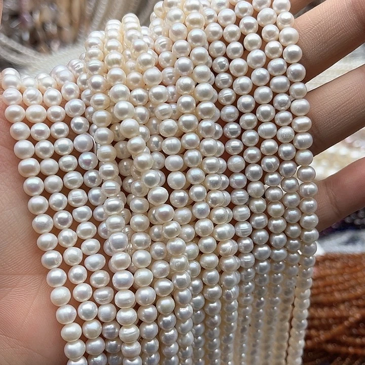 未镶嵌玛瑙/玉髓珠宝半成品一条5.5mm左右椭圆珍珠有生长纹