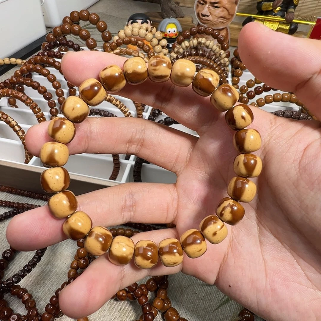 W***w紫金鼠手串实心花皮