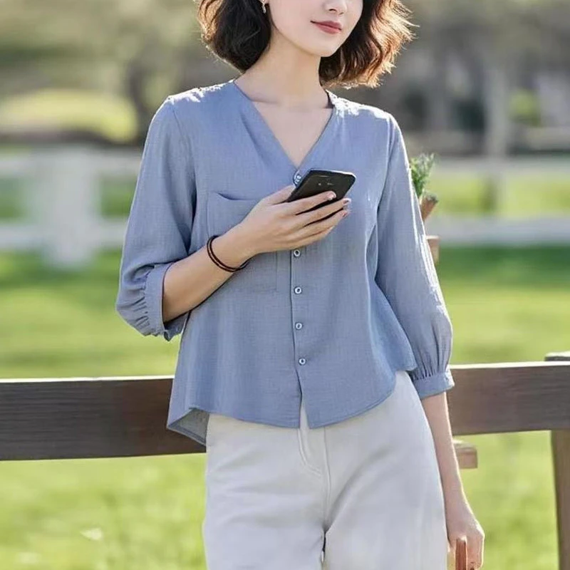 高级感时尚浅蓝色衬衫女2025夏季新款显瘦气质百搭女士七分袖衬衣