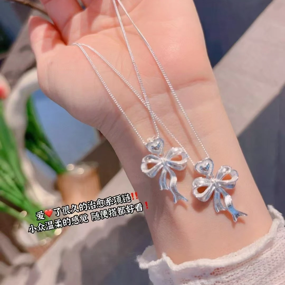 坠链均足银 足银990心形蝴蝶结侧身项链银色爱心套链