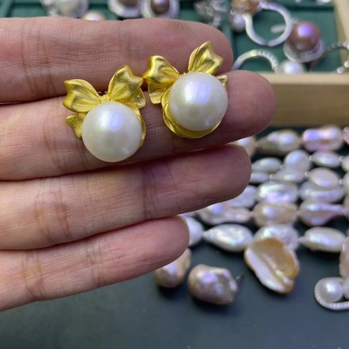 淡水珍珠耳饰合金胖*?