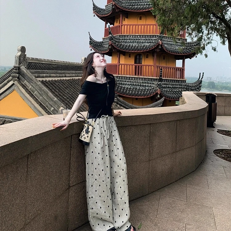 2025夏季新款韩系穿搭松弛感一字肩黑色上衣搭配波点阔腿裤两件套