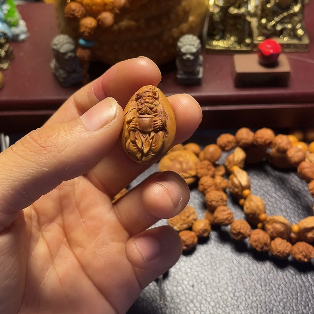 贤***余大桃核雕刻钟馗单籽