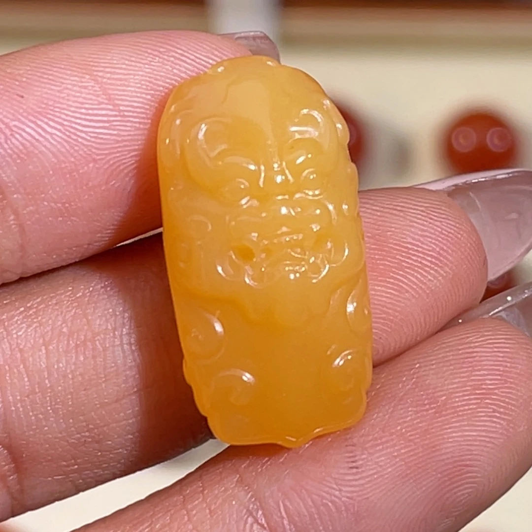 未镶嵌石英质玉（黄龙玉）兽面