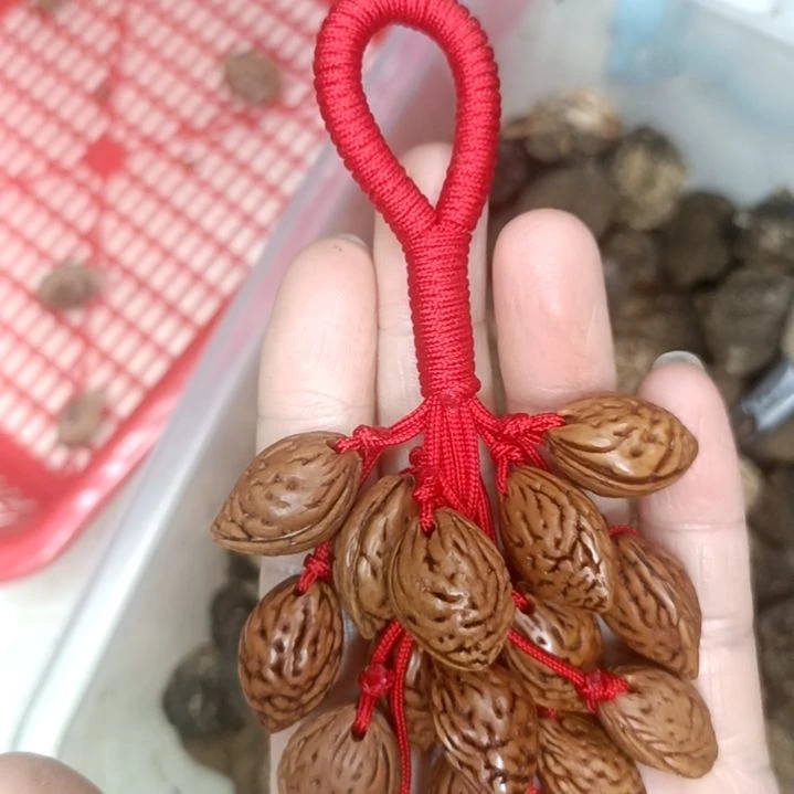 圆****圆桃核手串