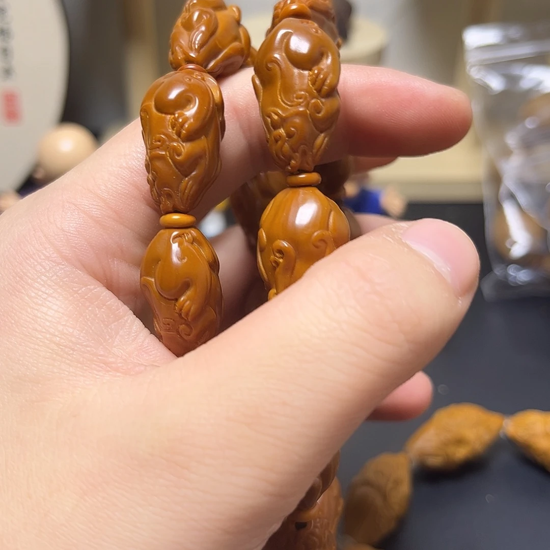 吊坠橄榄核头哦图吞吐我