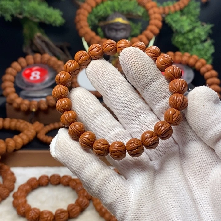 桃核吊坠左**右秦岭龙纹