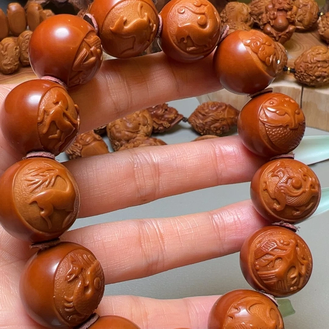 橄榄核手串光珠青铜兽面