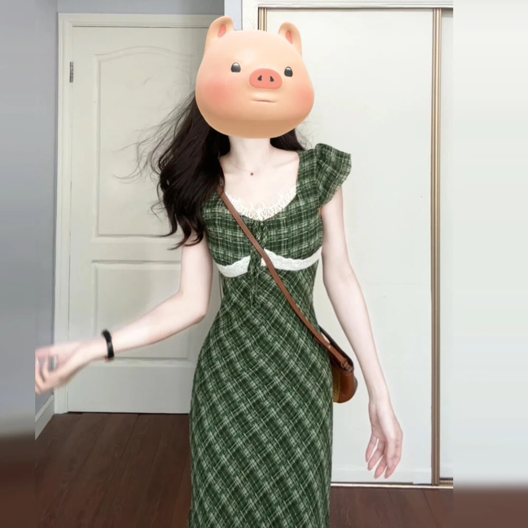 茶歇法式复古绿色格子蕾丝拼接连衣裙子女夏季爆款绝美巨好看长裙