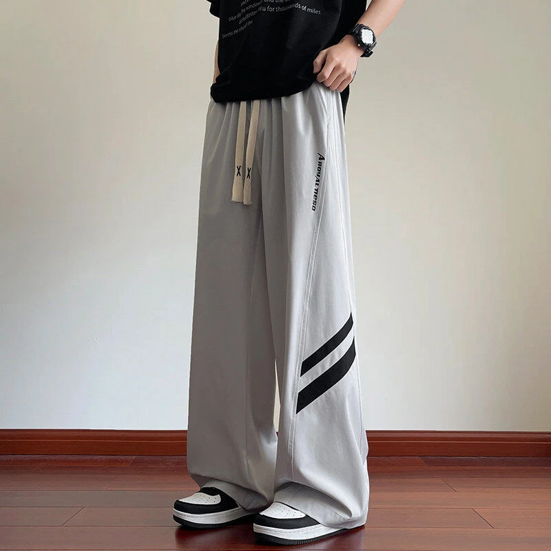 高品质夏季宽松冰丝速干清爽直筒阔脚男休闲裤拉条子拼接时尚长裤