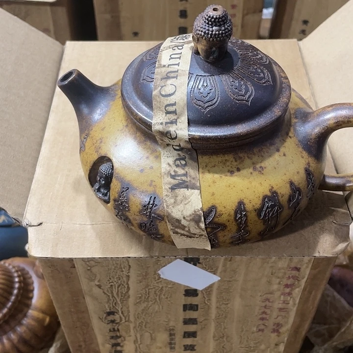 茶壶紫砂矿泥要手工制作的一把紫砂壶。