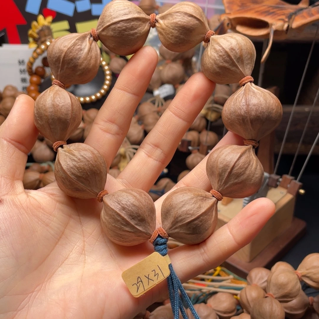 黑***钓吊坠橄榄核2931四花铁核