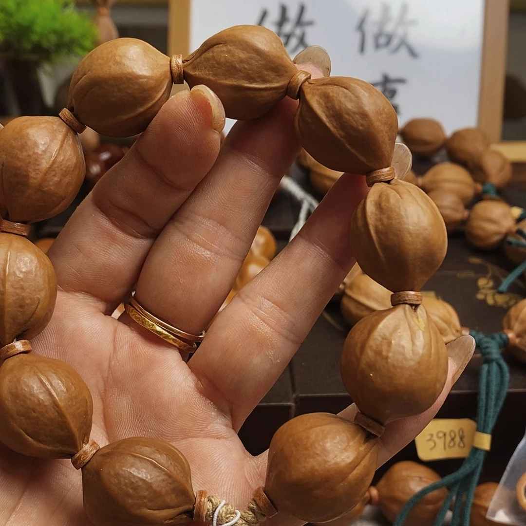 橄榄核吊坠龙**r梅林铁核2025