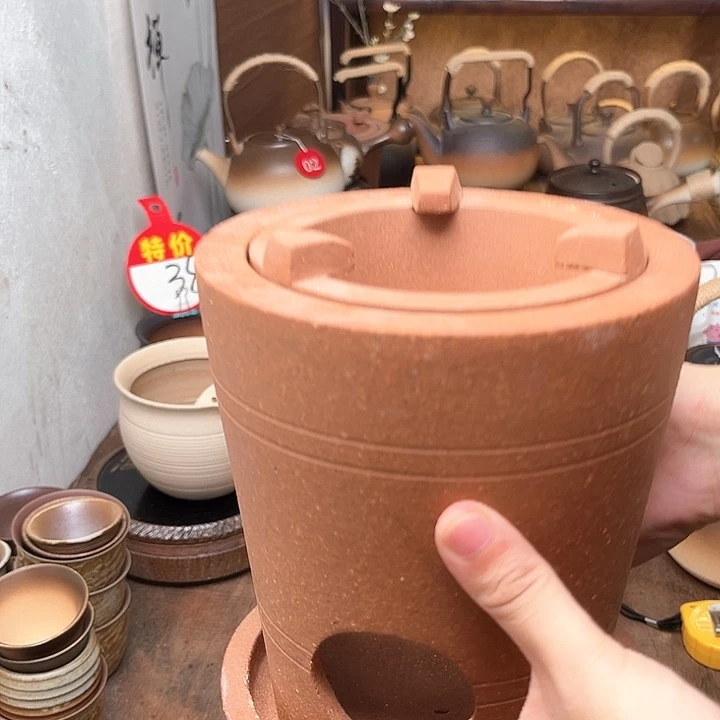 微瑕大圆柱炭炉一个。。。。。。。