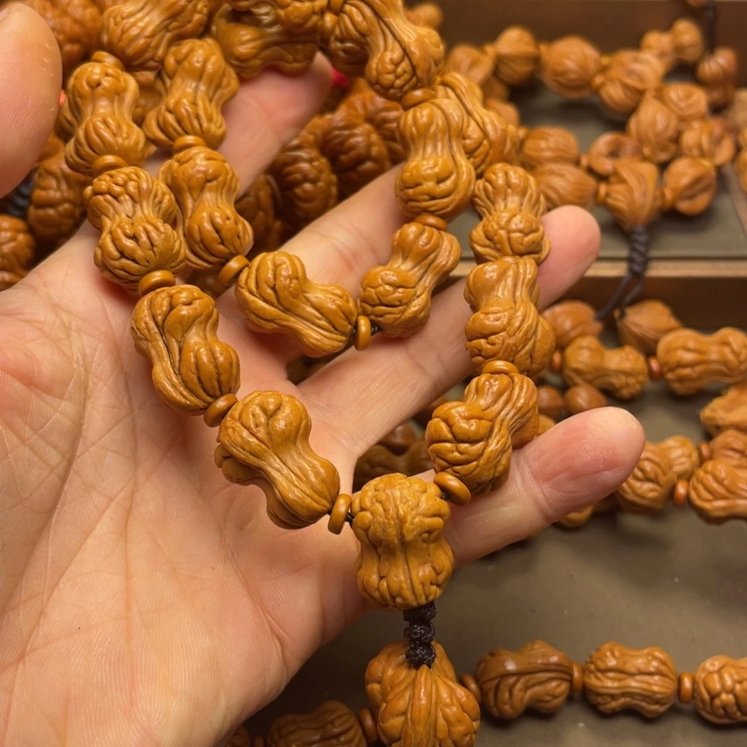 贺***三手串桃核龙纹桃核7