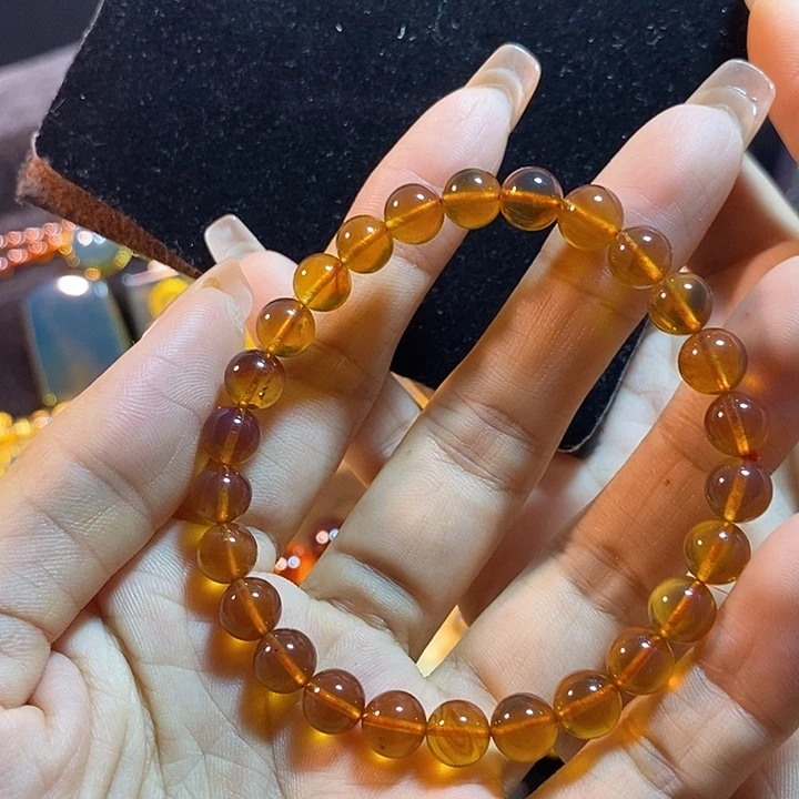 琥珀未镶嵌珠宝奇石棕红手串.7