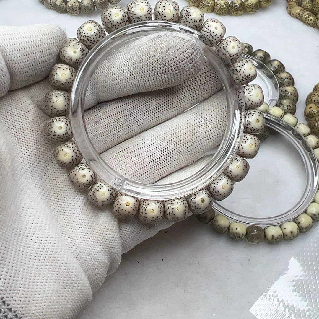 手串星月菩提10×9灰粉皮眼睛  1043