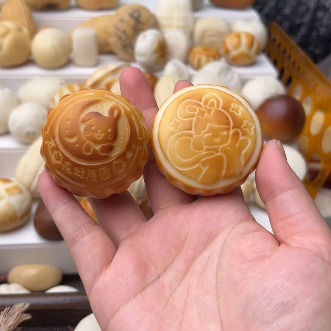 狮***宝把件菩提根/象牙果定制2个双面月饼预存费用
