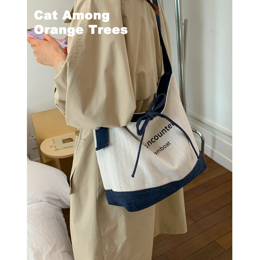 《云渊蓝白》韩国帆布包包女2025新款时尚水桶包慵懒风大容量斜挎包