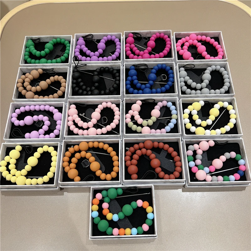 ins原创高级感彩色防丢手腕挂绳紫色弹力硅胶串珠马卡龙手机挂链